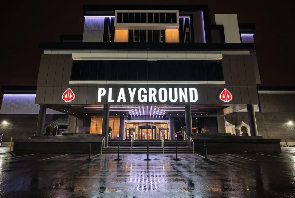 The Playground entrance on a rainy night